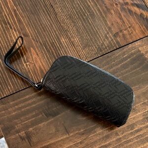 Black Oakley sunglass case